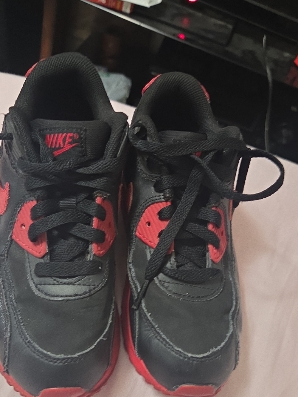 Nike Kids Black Sneakers with Red Accents